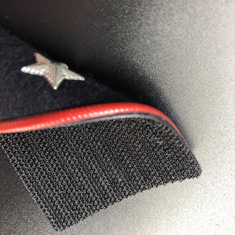 Customizable Clothing Tags Labels with 3D raised lettering embossed by high frequency voltage for tactile branding on matte and fleece surfaces